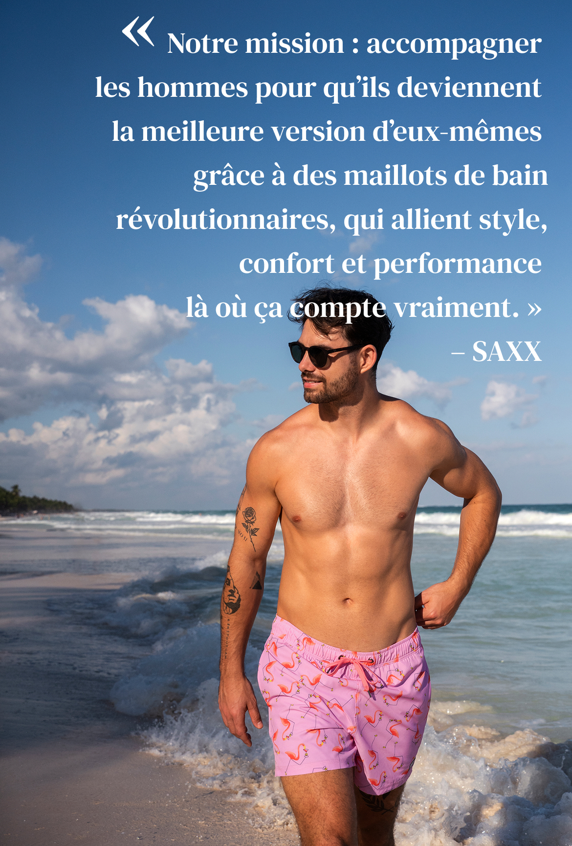 Un homme portant un maillot de volley rose à motif de flamants rose de SAXX – Bikini Village
