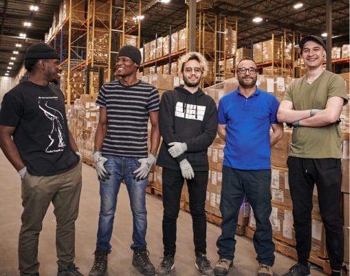A group of workers in a Distribution center - Bikini Village